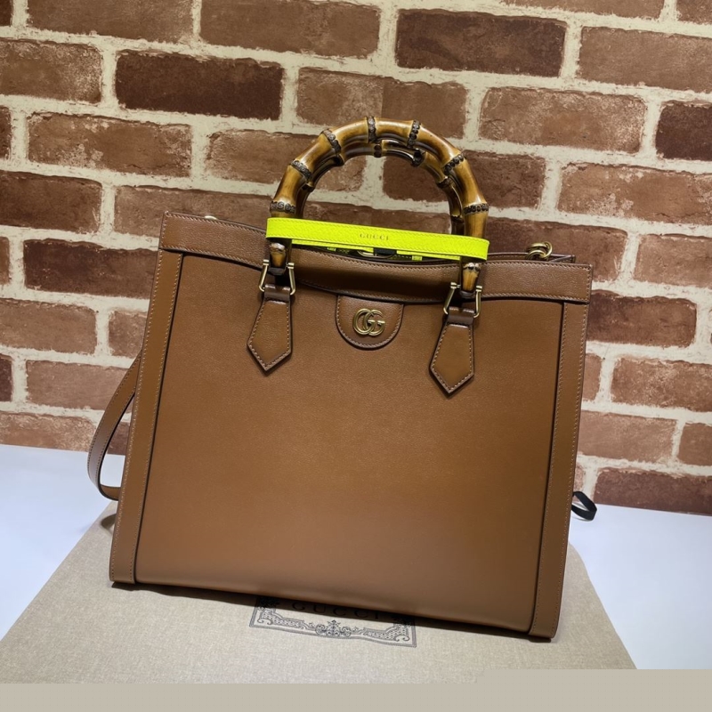G*u*i top handle bags